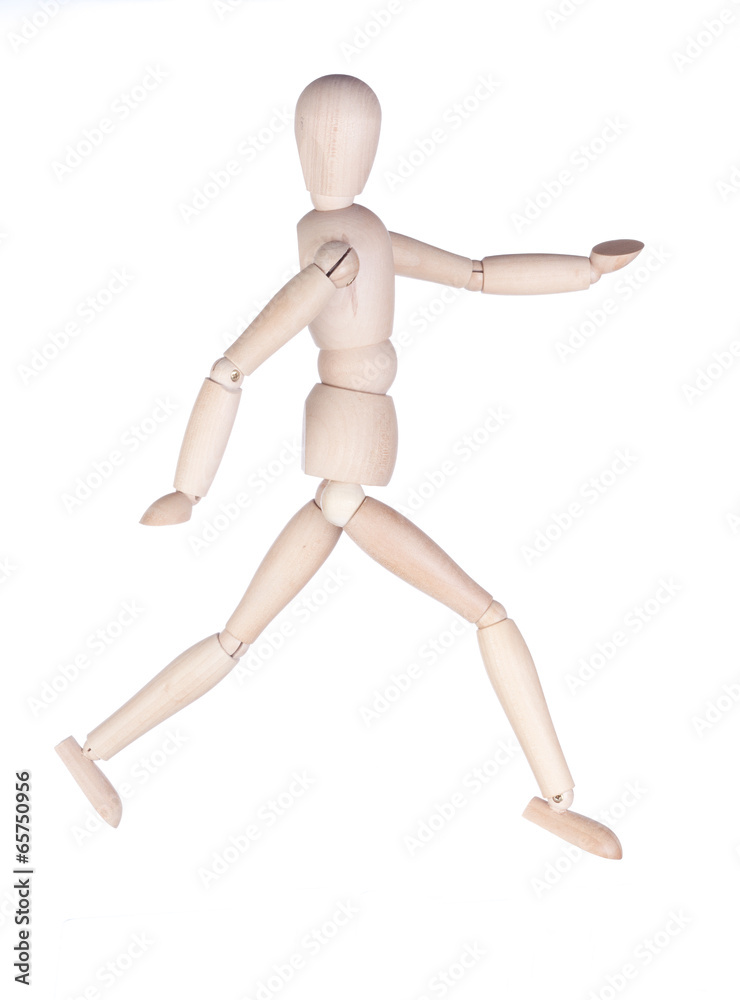Wooden hinged dummy representing running person Wooden hinged dummy representing running person