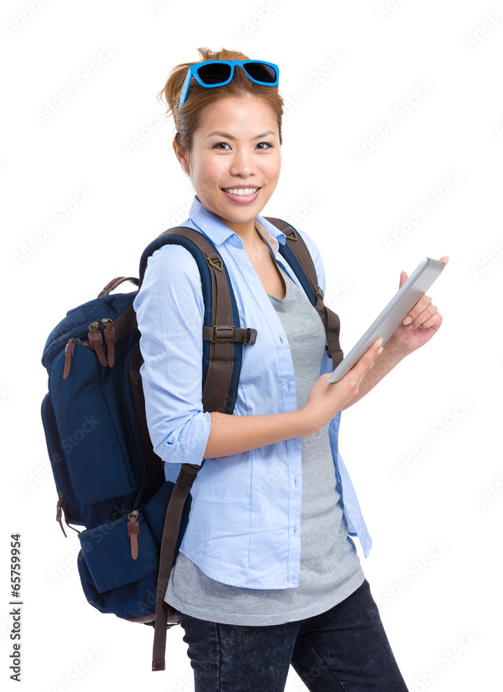 Female backpacker use tablet
