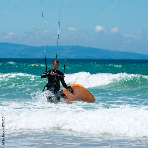 Kite surfing on a pristine beach