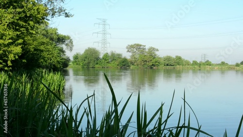 lake(shore) - with green nature with high voltage photo