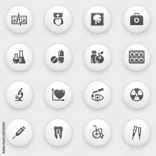 Medicine icons with white buttons on gray background. © Iurii Timashov