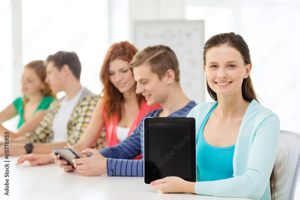 smiling students with tablet pc at school smiling students with tablet pc at school