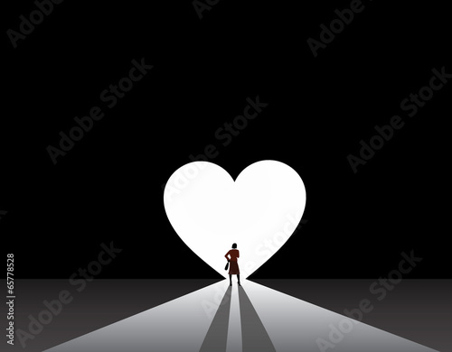 well dressed woman silhouette stand front of big love heart door