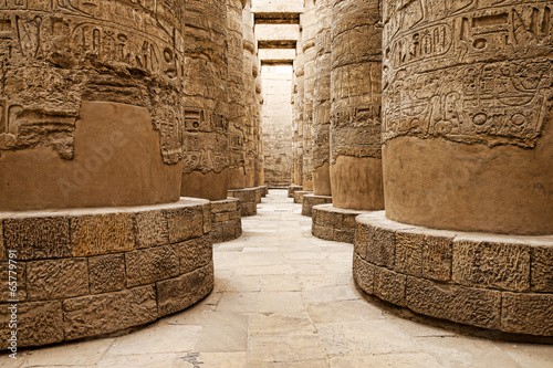 Close up of columns covered in hieroglyphics, Karnak, Egypt. photo