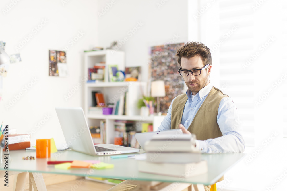 young architect working at office