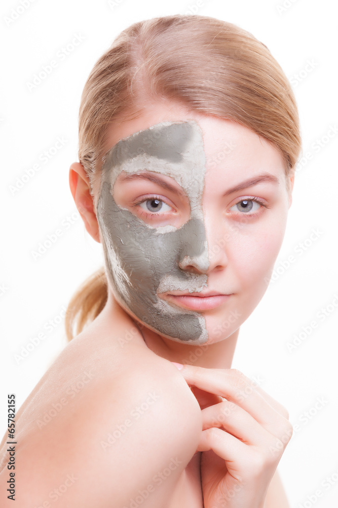 Skin care. Woman applying clay mask on face. Spa. Skin care. Woman applying clay mask on face. Spa.