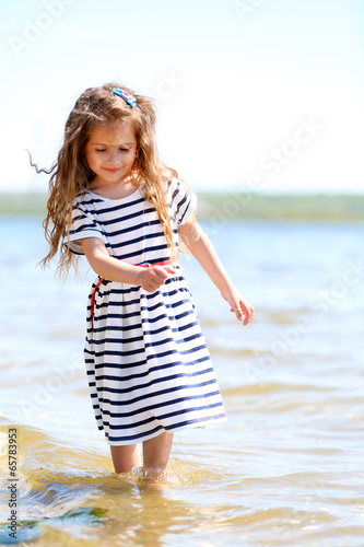 Beautiful little girl on th...