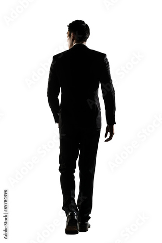 rear view of business man walk