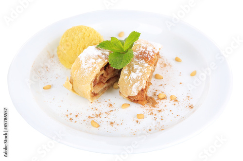 Tasty homemade strudel with mint leaves and ice-cream