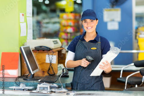 female cashier at hardware store photo