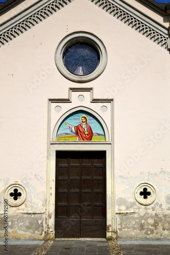 italy brass brown knocker and wood  door  church photo