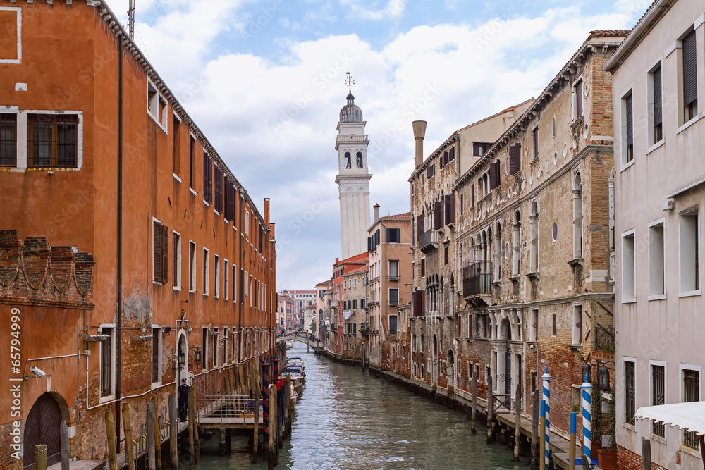 Leaning tower of San Giorgio dei Greci above the canal in Venice