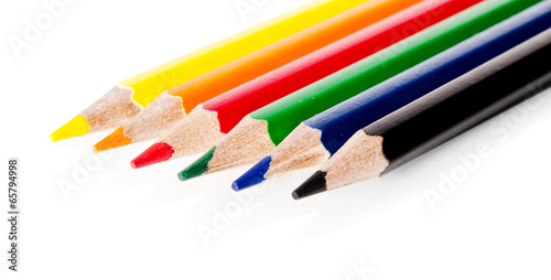 Beautiful multi-colored pencils isolated on white background photo