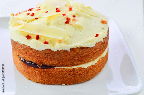 White chocolate jam and cream sponge cake