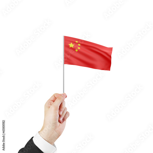 hand holding flag of China