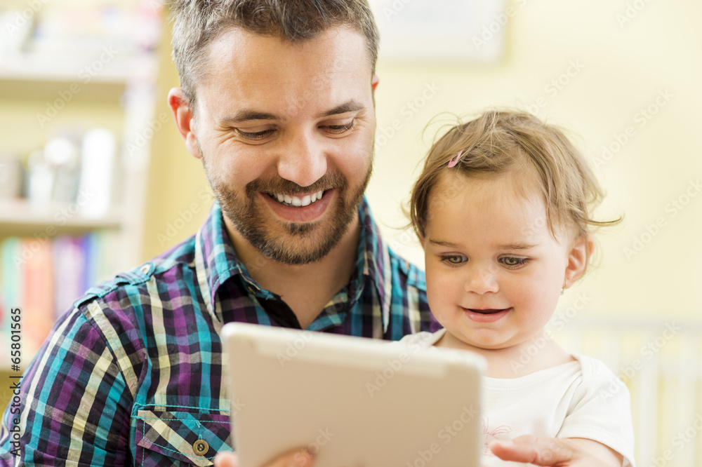 Father and daughter with tablet Father and daughter with tablet