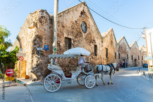 Traditional venetian brougham and horse at Greece photo