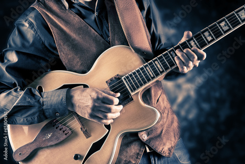 Obraz na plátně guitar player vintage image