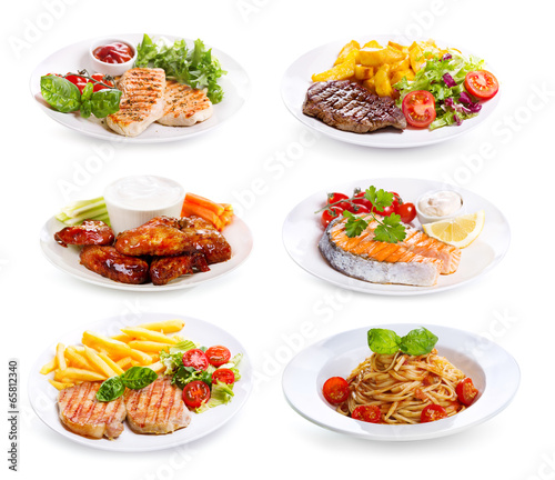 plates of various meat, fish and chicken