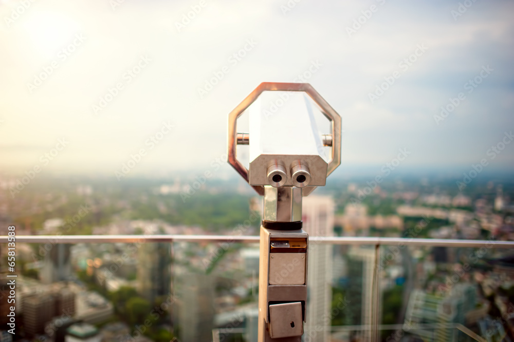 hand held telescope on top of skyscraper at observation deck hand held telescope on top of skyscraper at observation deck