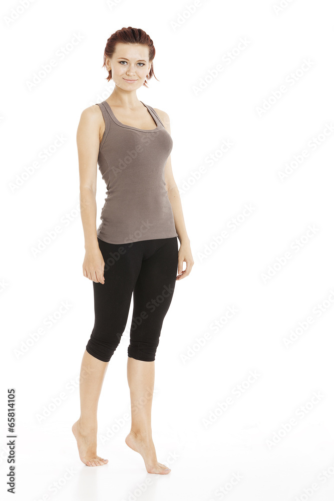 Fitness woman stretching her leg to warm up Fitness woman stretching her leg to warm up