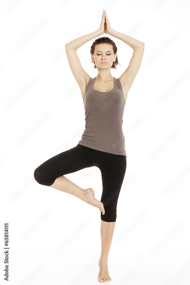 Fitness woman stretching her leg to warm up Fitness woman stretching her leg to warm up