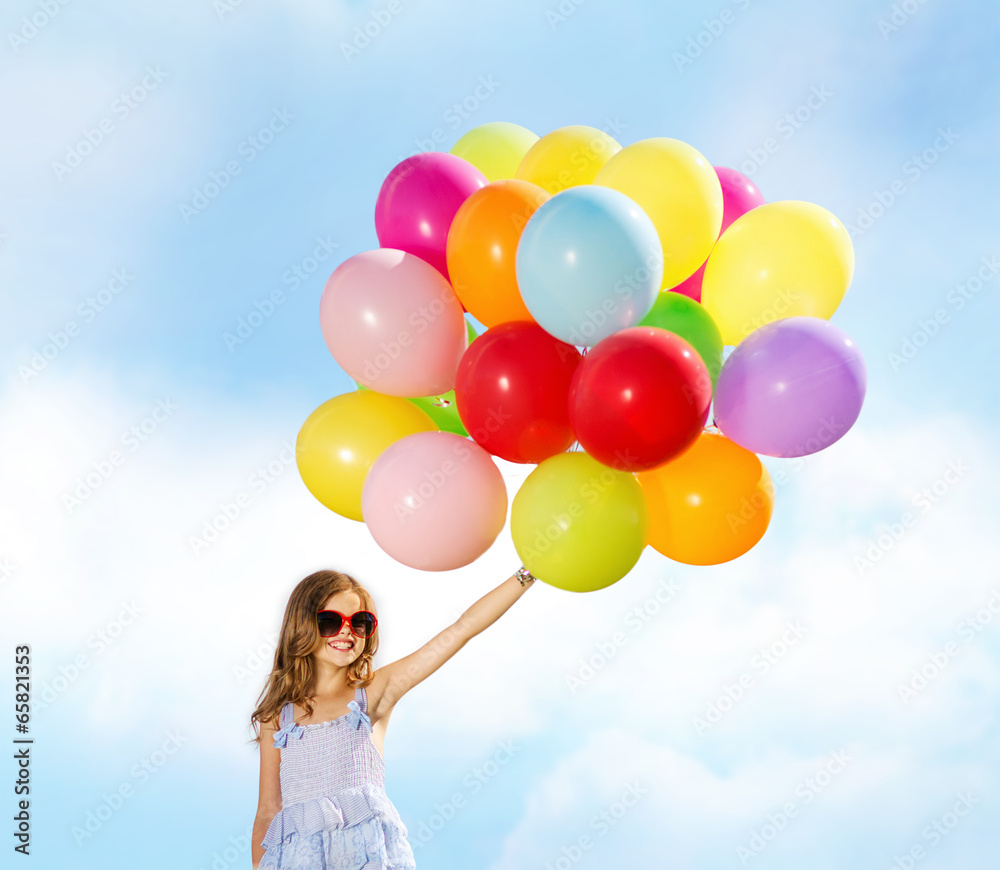happy girl with colorful balloons