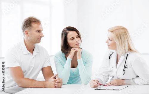 doctor with patients in cabinet