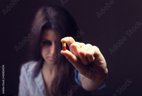 Girl with pills