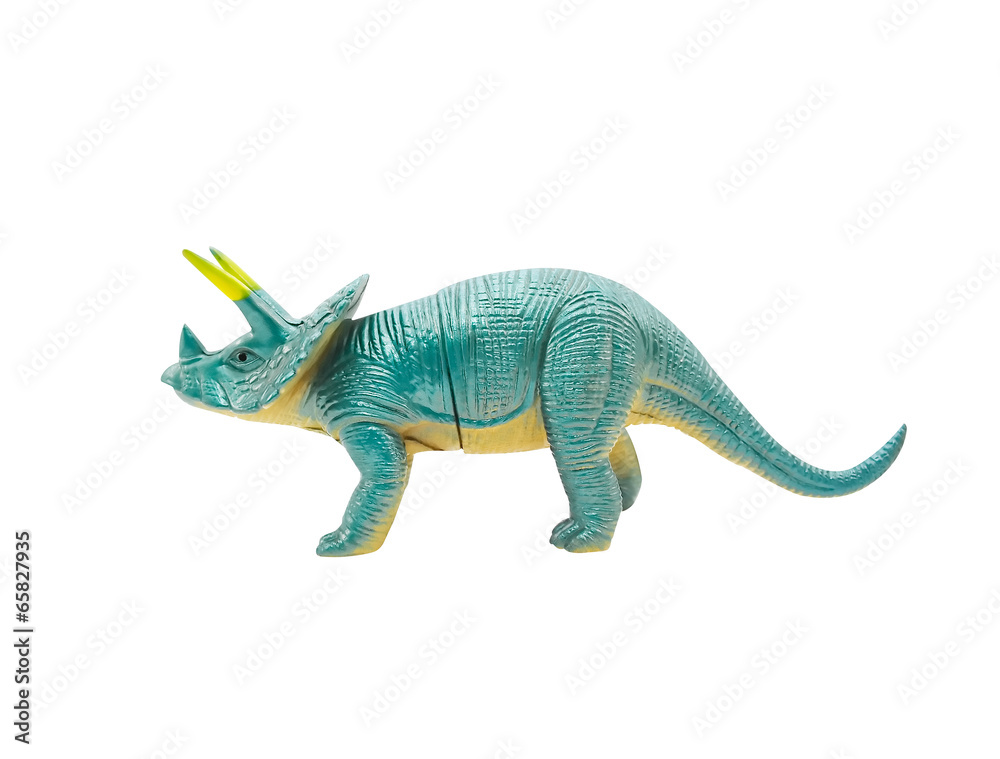 Isolated photo of triceratops dinosaur plastic toy on white background.