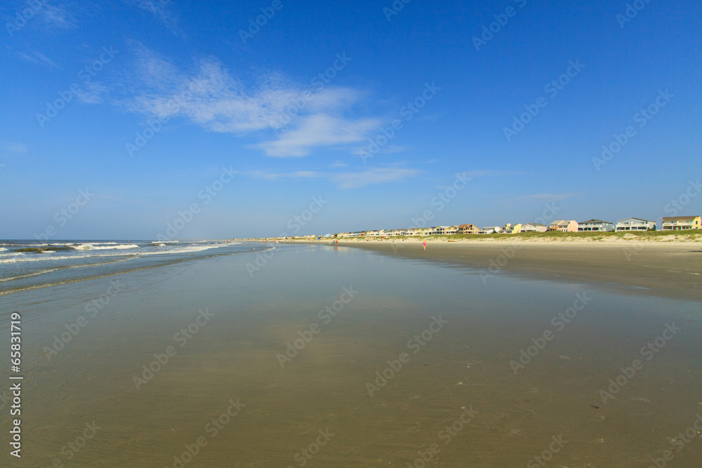 Color DSLR wide angle view of Sunset Beach, North Carolina in the early morning; horizontal with copy space for text Color DSLR wide angle view of Sunset Beach, North Carolina in the early morning; horizontal with copy space for text