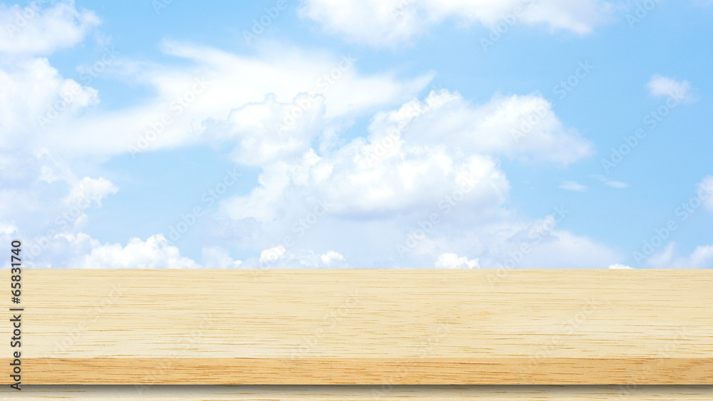 Fototapeta premium Wooden table and blue sky.