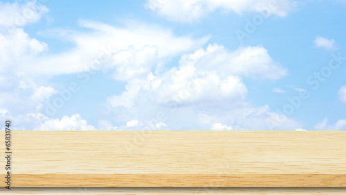 Wooden table and blue sky.