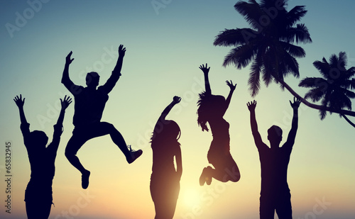 Silhouettes of Young People Jumping with Excitement photo