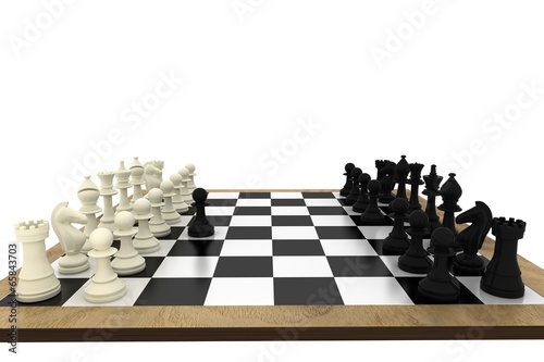 Black and white chess pieces on board