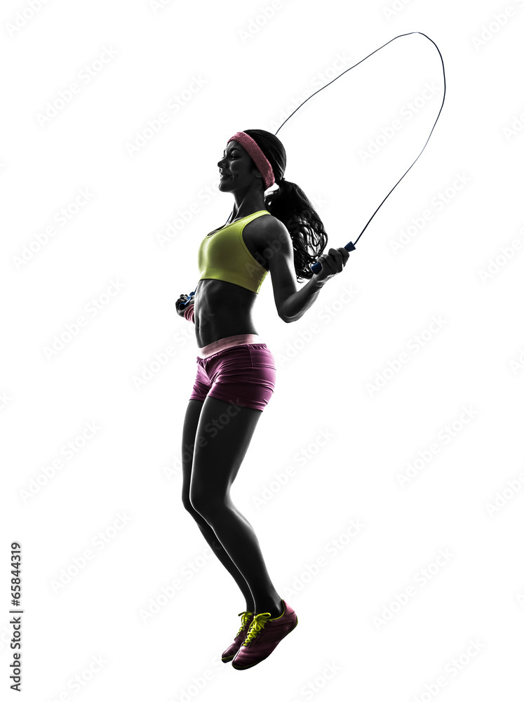 woman exercising fitness jumping rope silhouette woman exercising fitness jumping rope silhouette