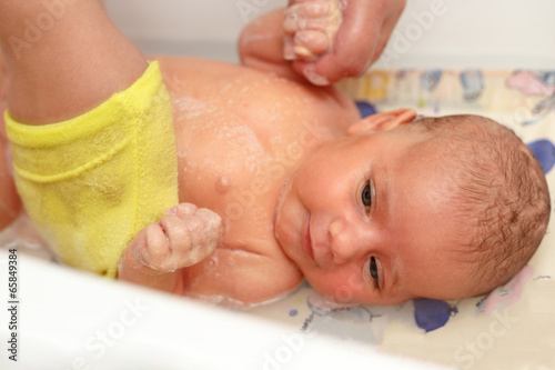 take a bath for a young adorable baby