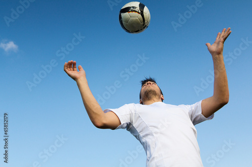 football player striking the ball at the stadium © nenetus