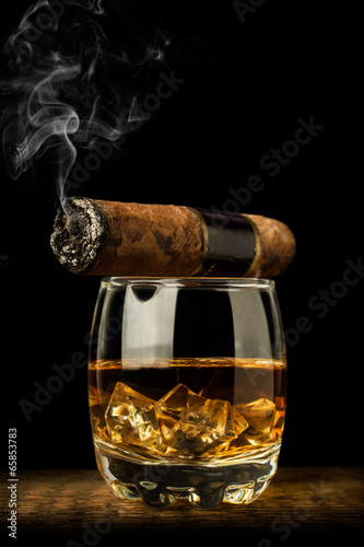 whiskey and smoking a cigar
