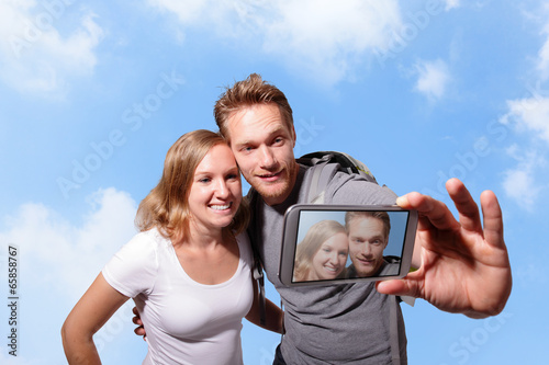 happy couple selfie by smart phone