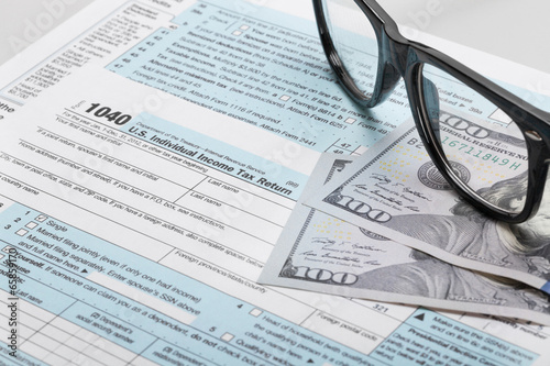 United States of America Tax Form 1040 with glasses