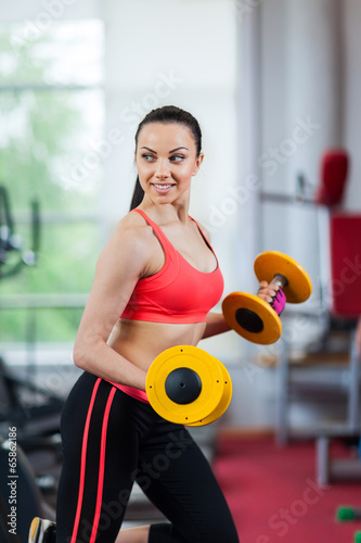 Sport woman exercising gym, fitness center