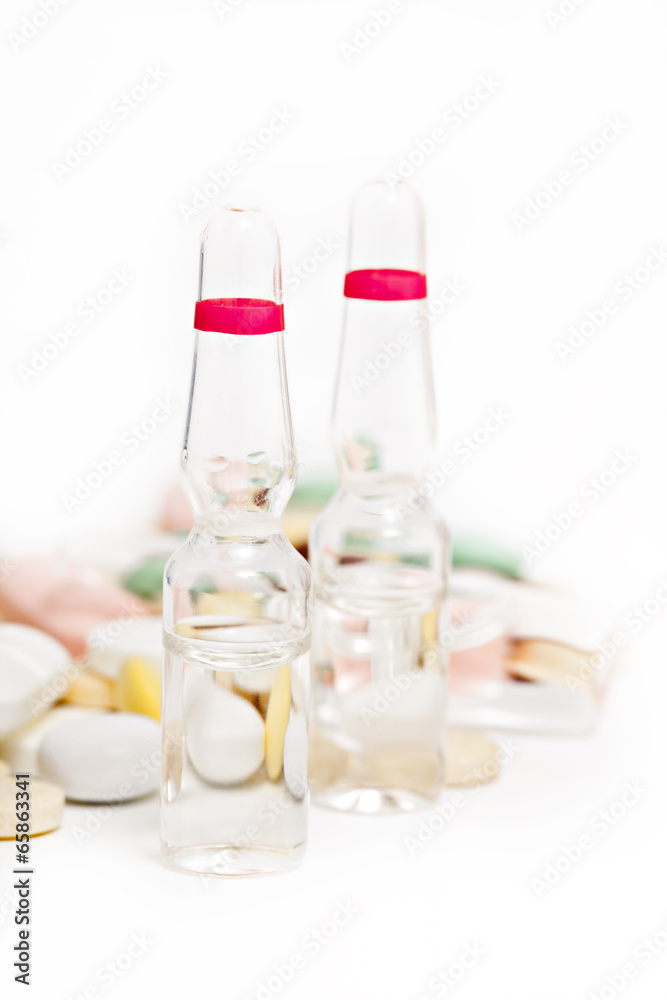 pills, ampule and capsule drug on white