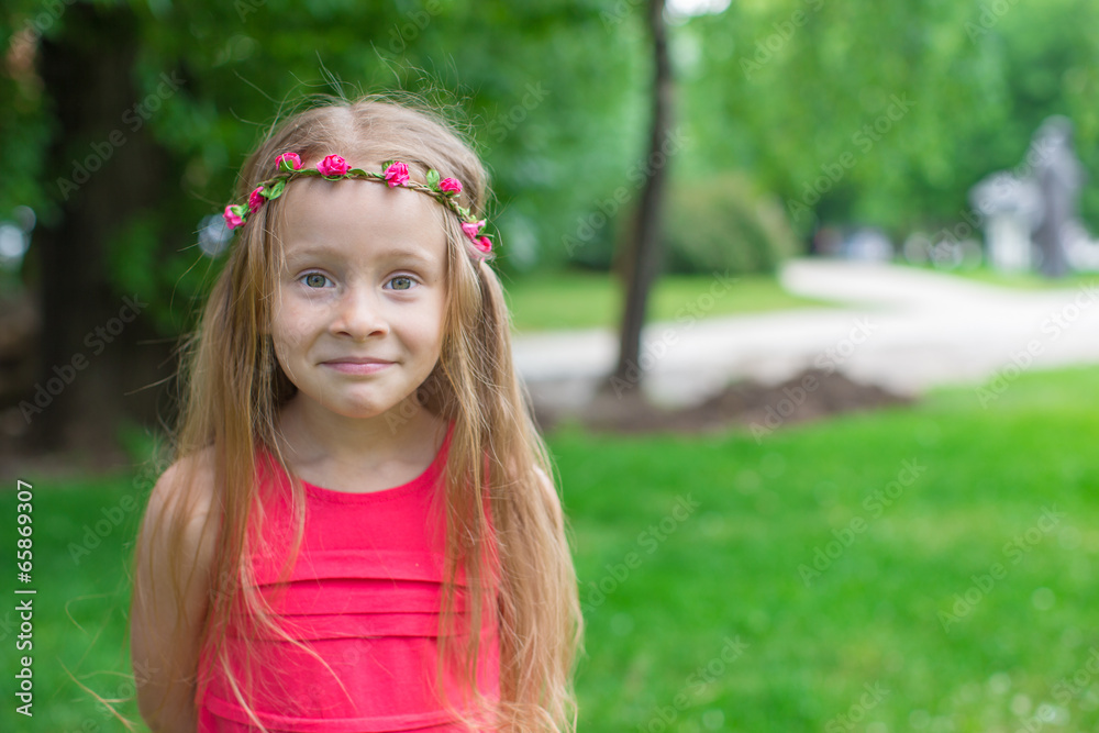 Portrait of adorable funny little girl on summer weekend Portrait of adorable funny little girl on summer weekend