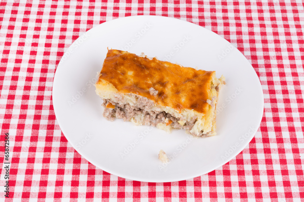 potato pie on a white plate potato pie on a white plate