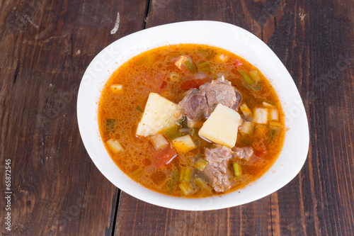 Goulash soup in a yellow bowl