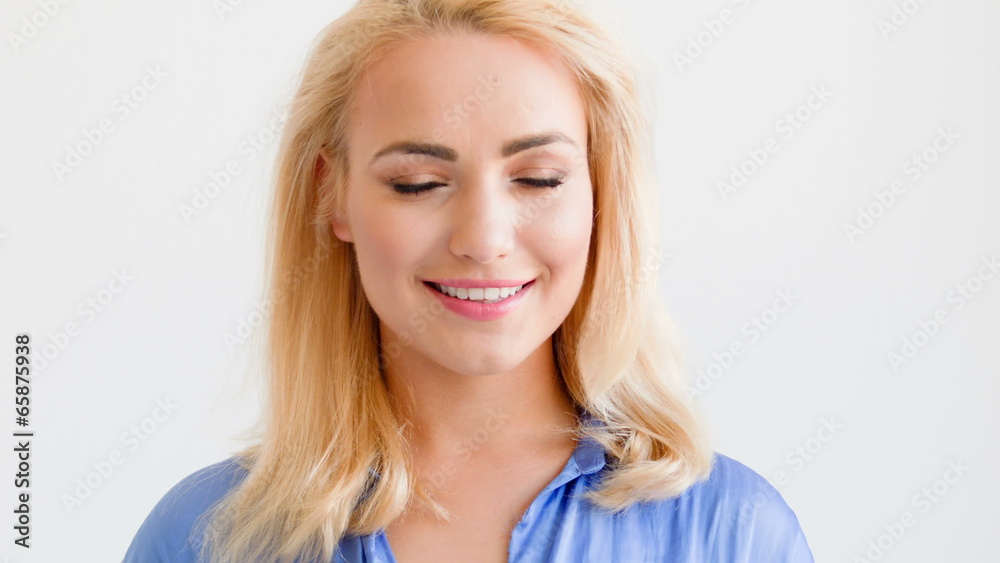 Young Girl Looking at Copyspace and Smiling Isolated on White Young Girl Looking at Copyspace and Smiling Isolated on White