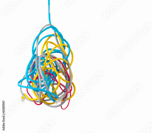Obraz na płótnie Cluster of chaotic tangled network cables isolated on white back w salonie