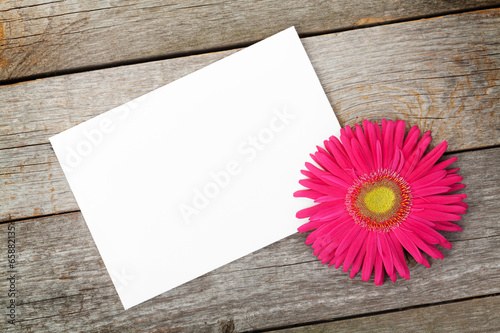Fototapeta Naklejka Na Ścianę i Meble -  Photo frame and gerbera flower