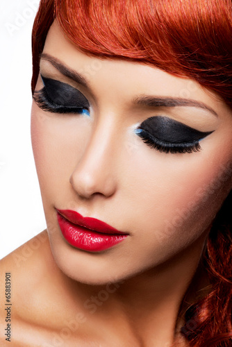 beautiful woman with red lips and fashion eye makeup